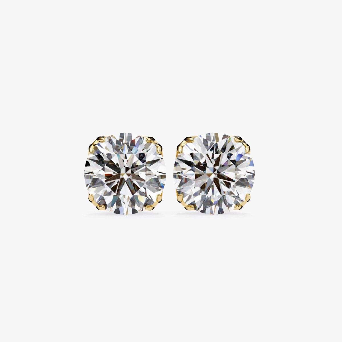 A pair of round lab-grown diamond stud earrings set in white gold with 8-prong settings. The diamonds are clear and bright.