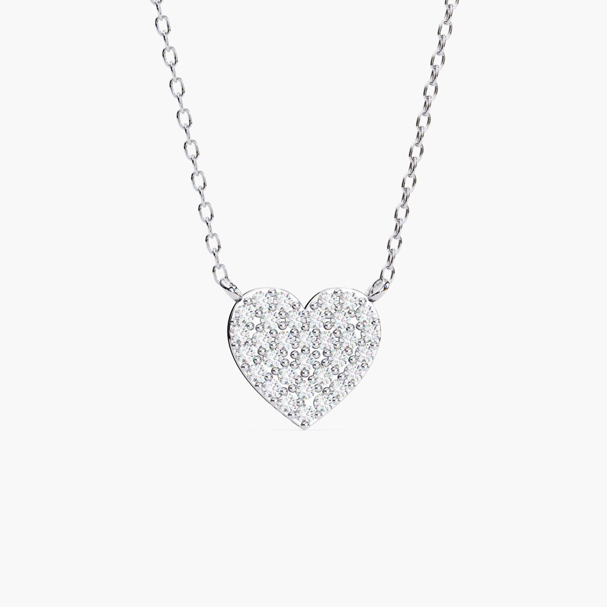 Front view of a pavé heart necklace in 14k white gold, featuring a heart-shaped pendant covered in round lab-grown diamonds and attached to a delicate cable chain.