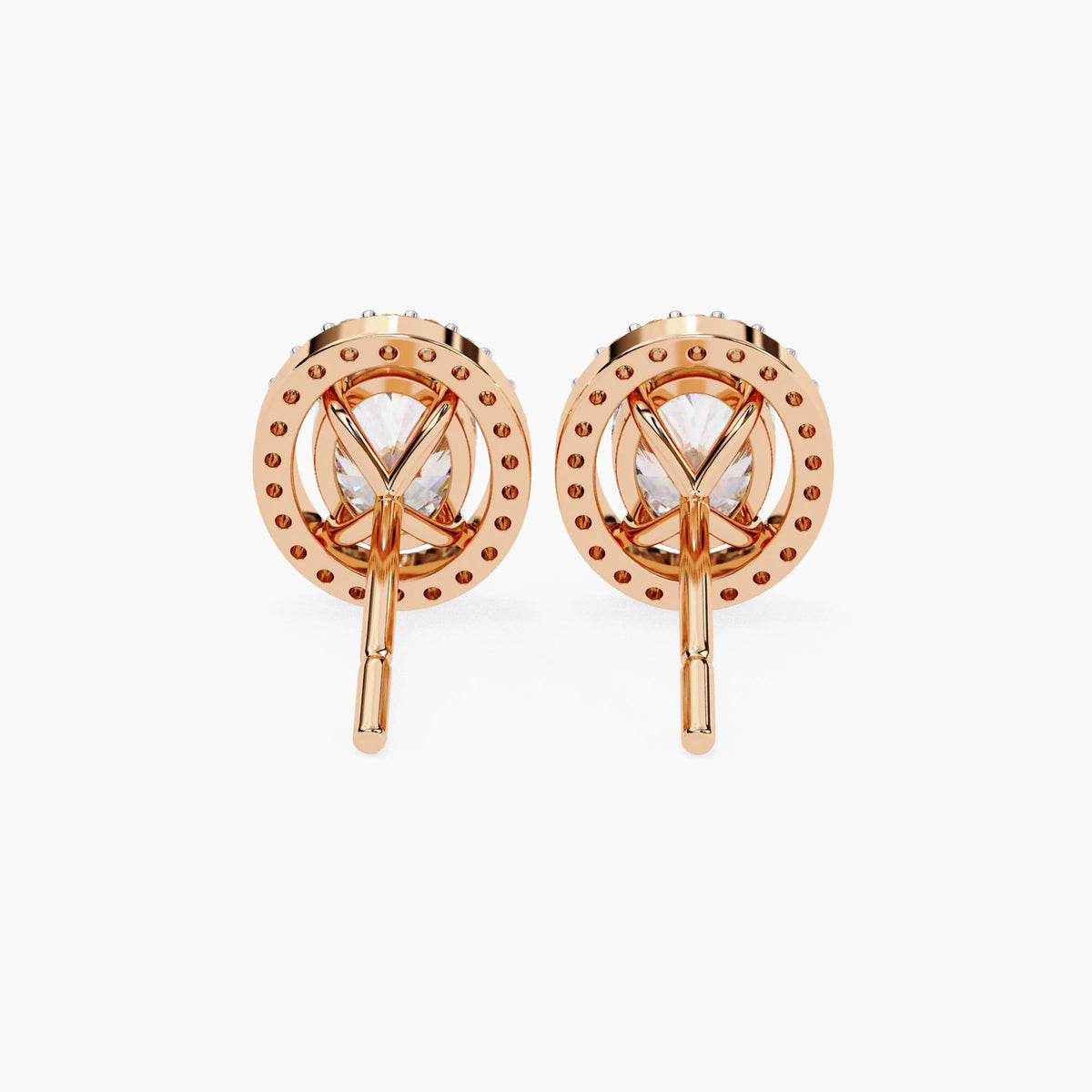 Back view of 14k rose gold oval halo stud earrings, showing the open basket-style setting, prongs, and straight posts.