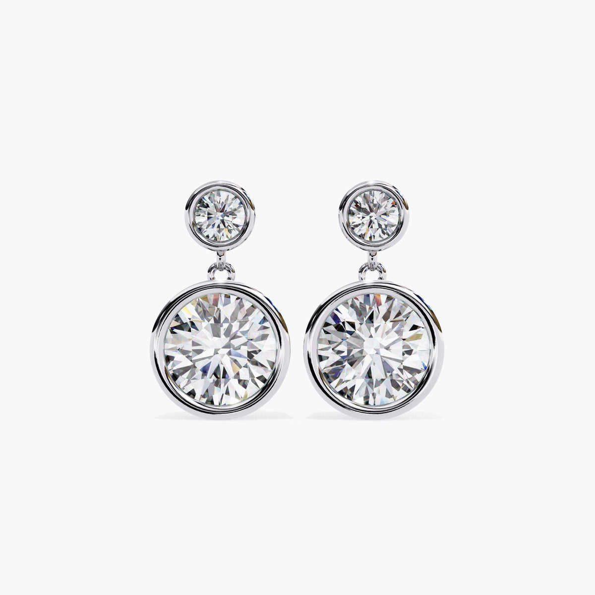 Front view of 14k white gold bezel-set drop earrings with two round lab grown diamonds per earring. Modern double circle design ideal for bridal wear, minimalist wedding earrings, or everyday diamond jewelry.