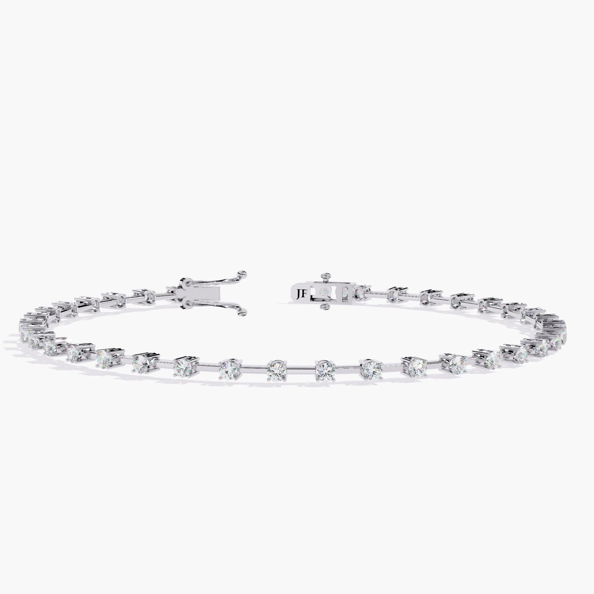 Full view of a 14K white gold diamond tennis bracelet with floating round diamonds in a minimalist bar setting. The bracelet forms a graceful curve, showcasing the secure double clasp and evenly spaced brilliant-cut diamonds. A refined and timeless gift for weddings, anniversaries, or milestone birthdays.