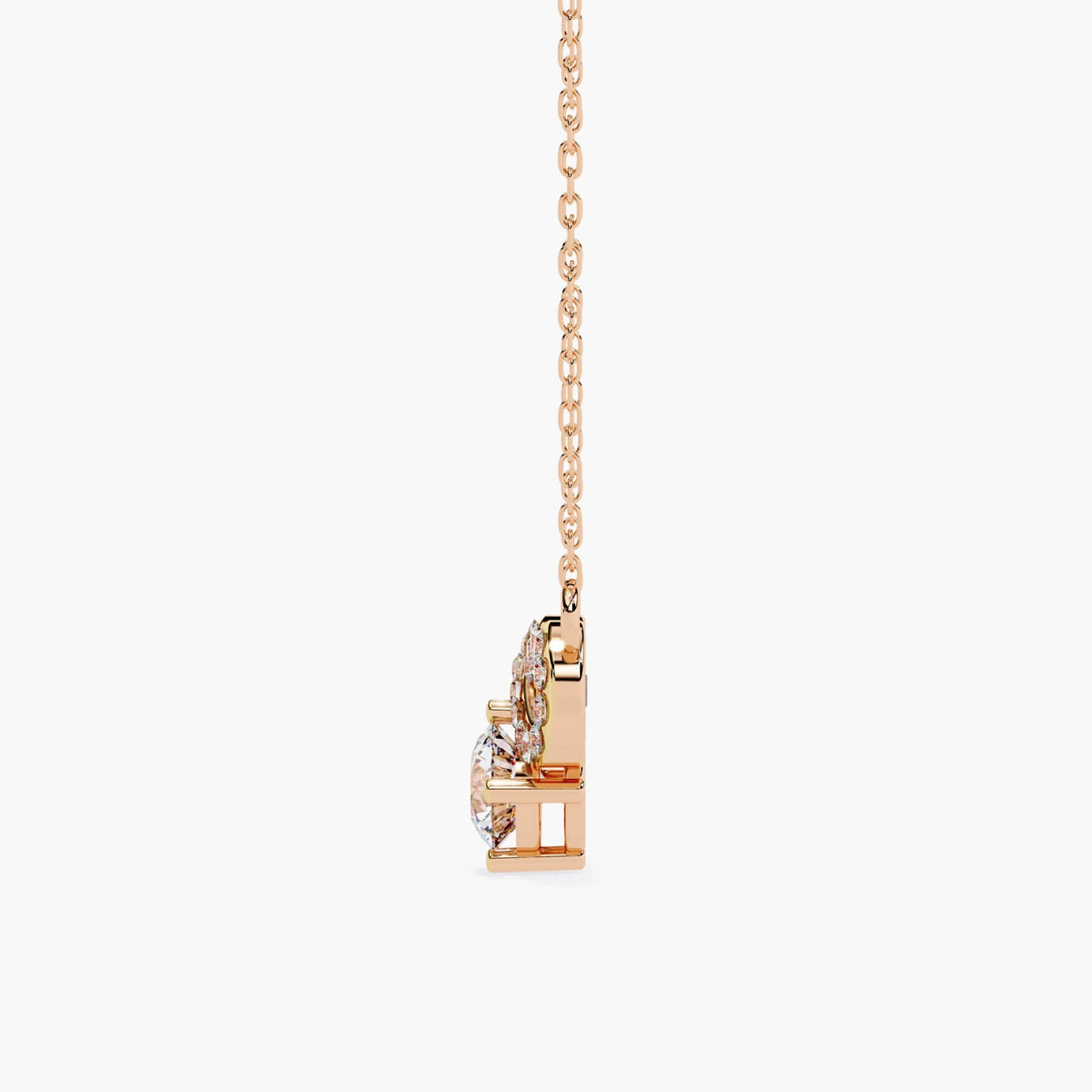 A rose gold infinity necklace with a diamond solitaire stone under the infinity symbol.