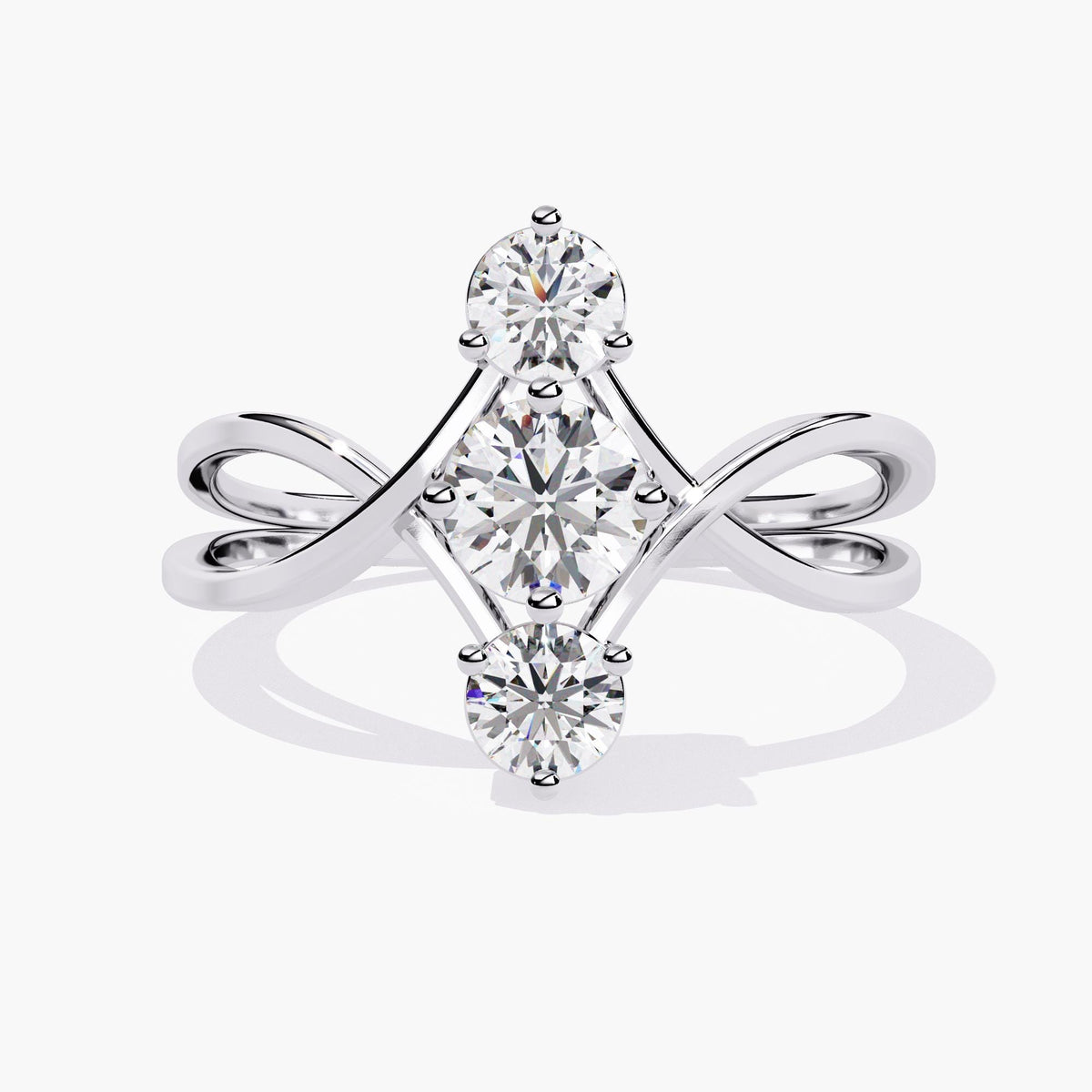 A white gold ring with three diamonds in the center.