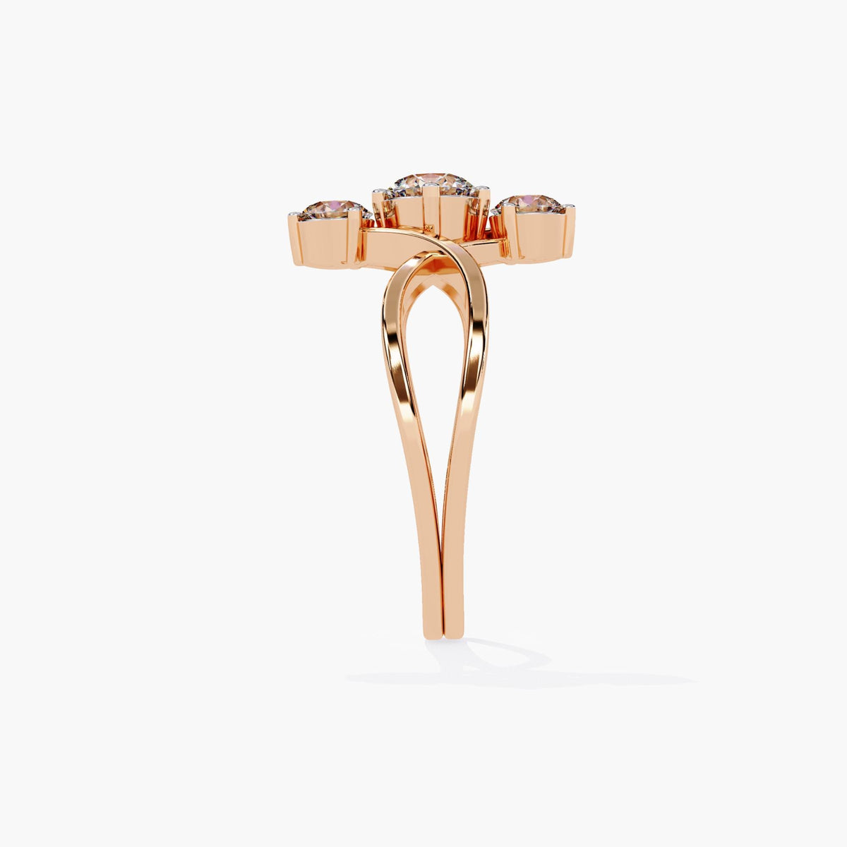 A rose gold ring with three diamonds in the center.