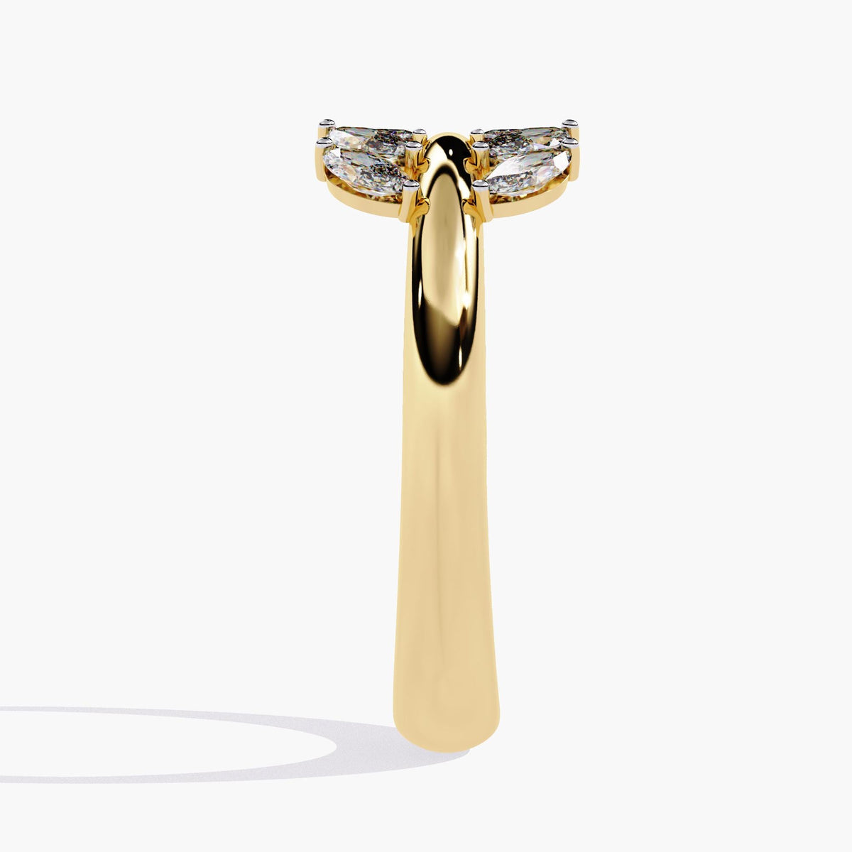 A gold ring with a leaf design and small diamonds.