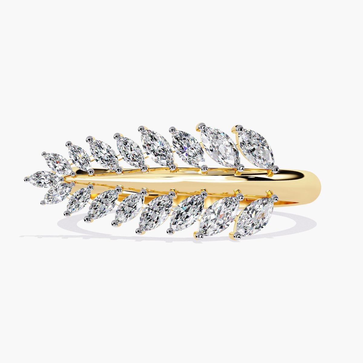 A gold ring with a leaf design and small diamonds.