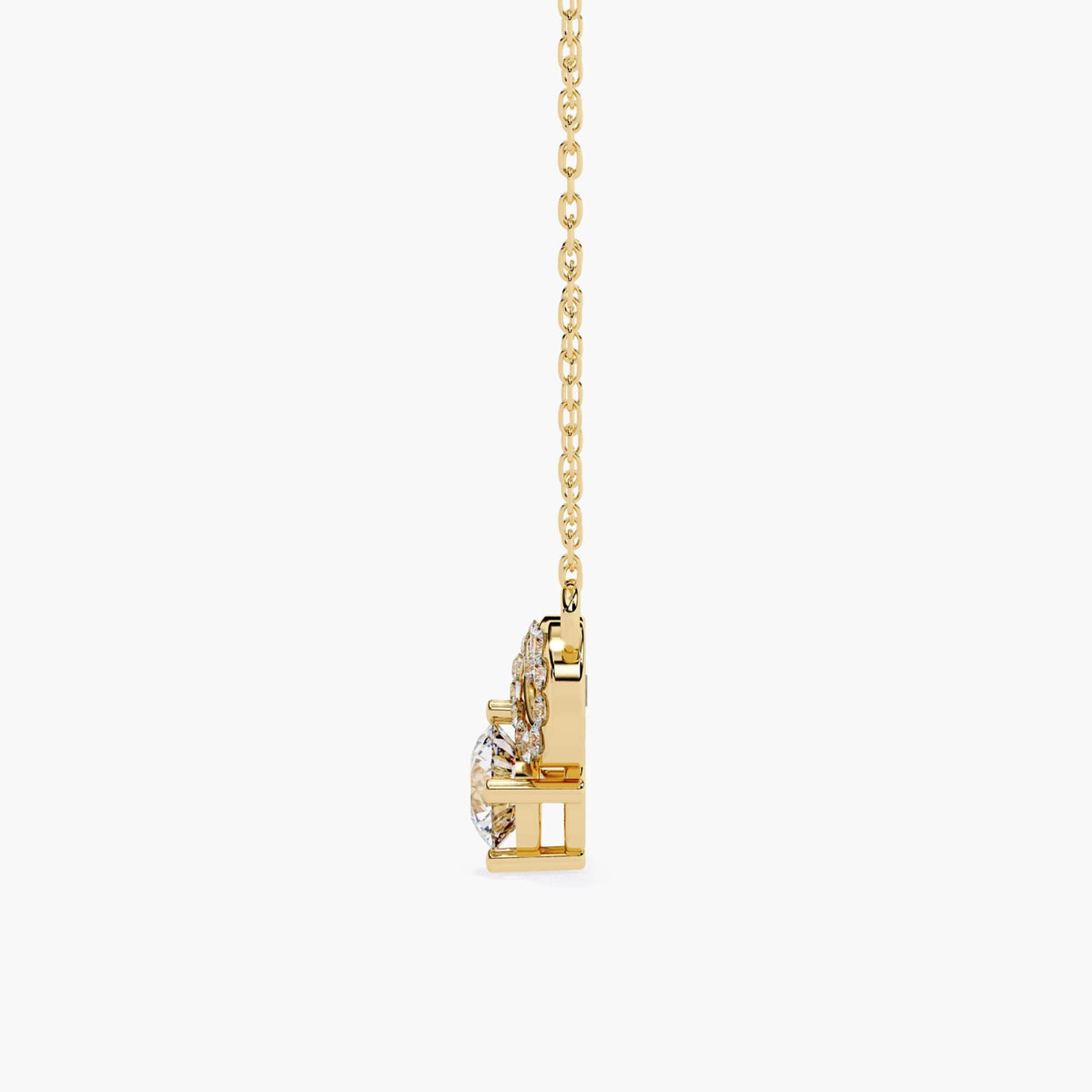 A gold infinity necklace with a diamond solitaire stone under the infinity symbol.