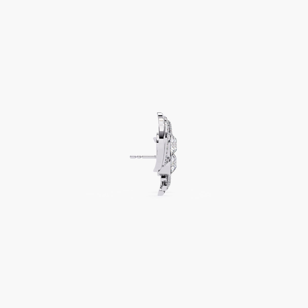 A pair of white gold earrings with a curved, asymmetrical shape and diamond stones.