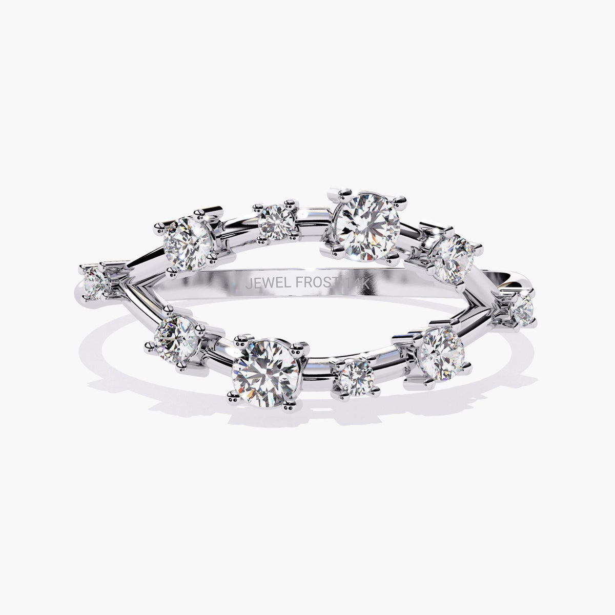 Front view of a 14K white gold ring featuring ten round natural diamonds arranged in staggered prong settings along a curved band. The alternating heights and spacing give the ring a clustered, radiant look suited for a modern diamond wedding band or anniversary ring.
