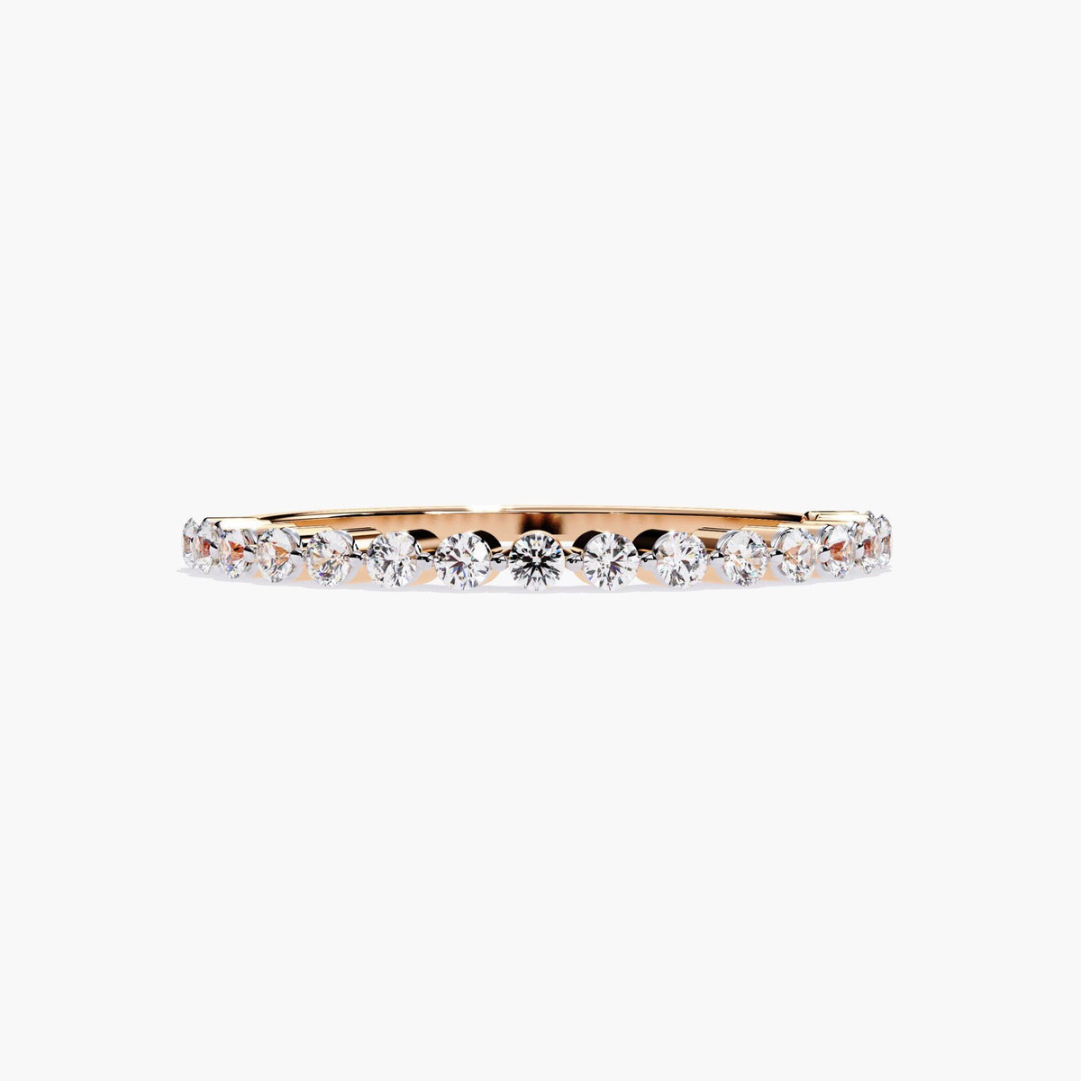 14k rose gold single prong diamond band featuring round natural diamonds in a clean shared prong setting. The soft rose gold tone contrasts beautifully with the bright diamonds, creating a delicate and modern stacking or wedding band.
