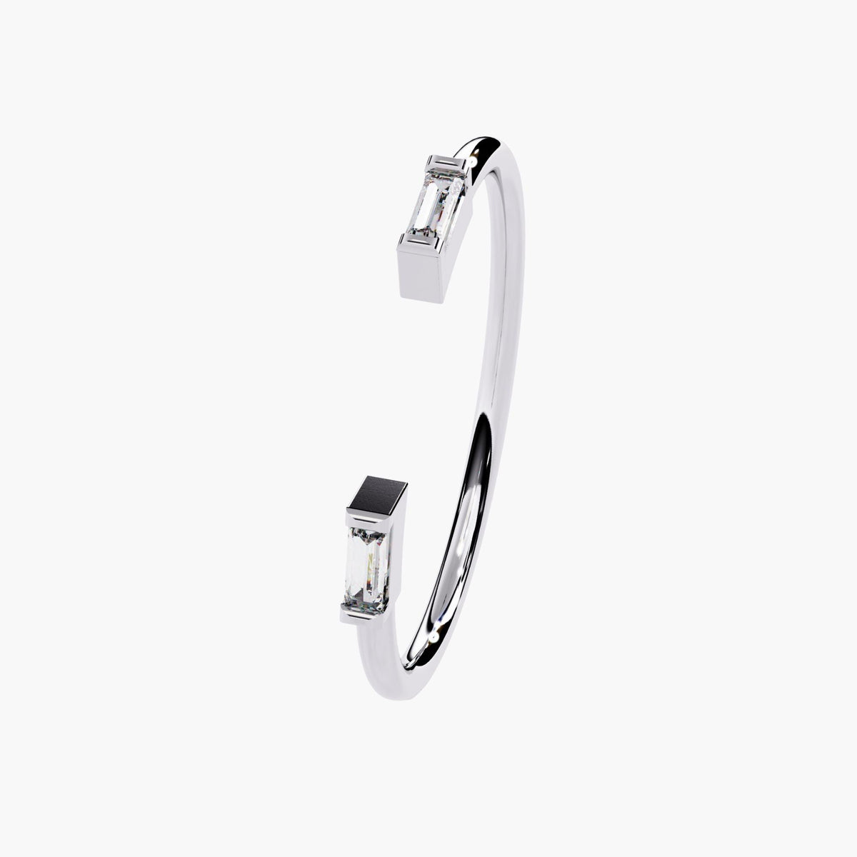 Angled view of a 14k white gold open ring with two baguette-cut diamonds bezel set at each end, highlighting the slim high-polish band and floating diamond tips.