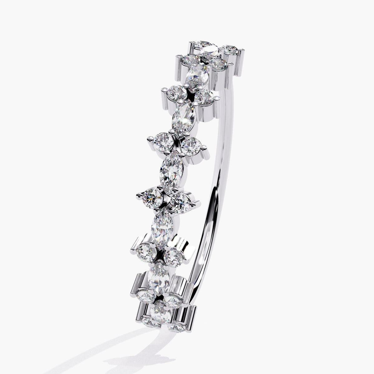 Angled view of a 14k white gold half eternity ring featuring horizontally set marquise diamonds alternating with round diamonds in a clustered pattern.