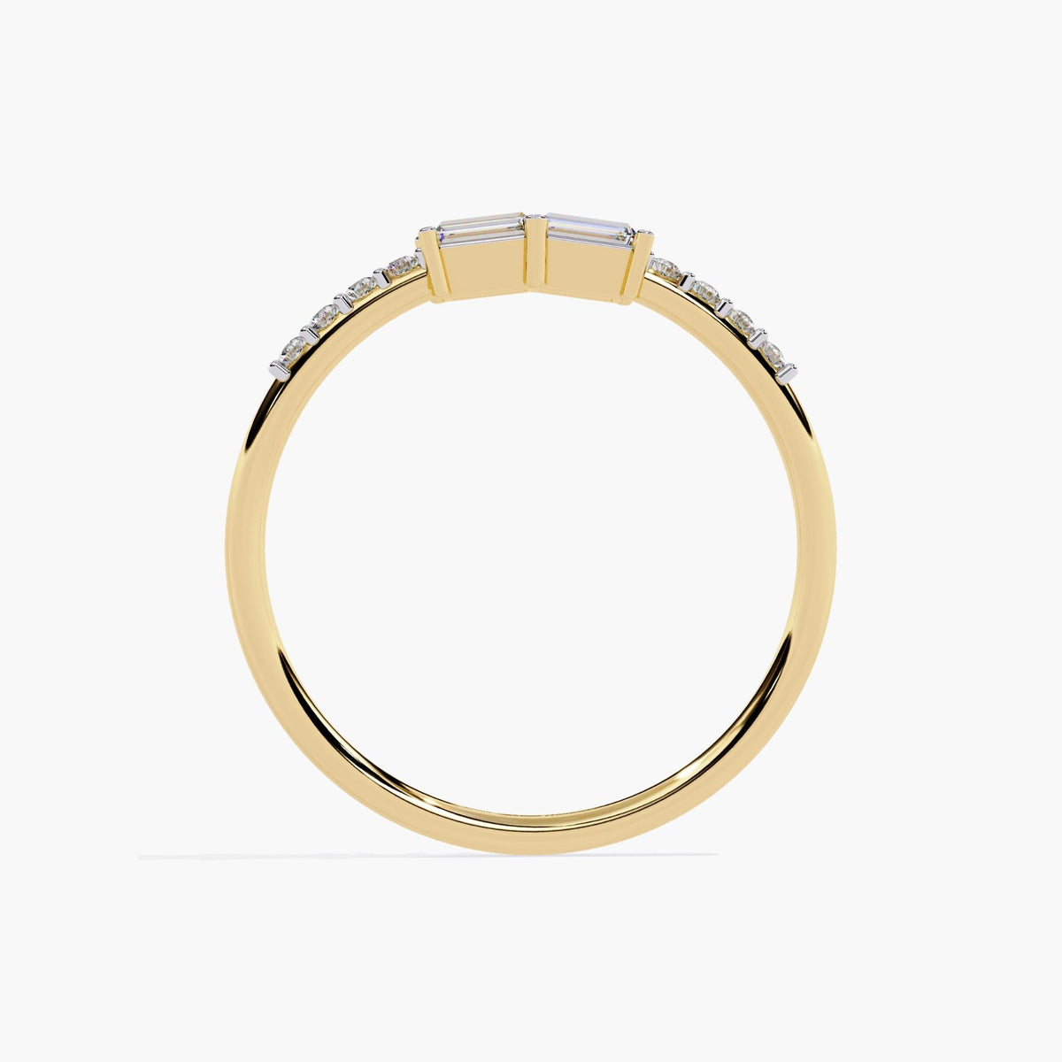A yellow gold band ring with a baguette diamond and smaller round diamonds on the band.