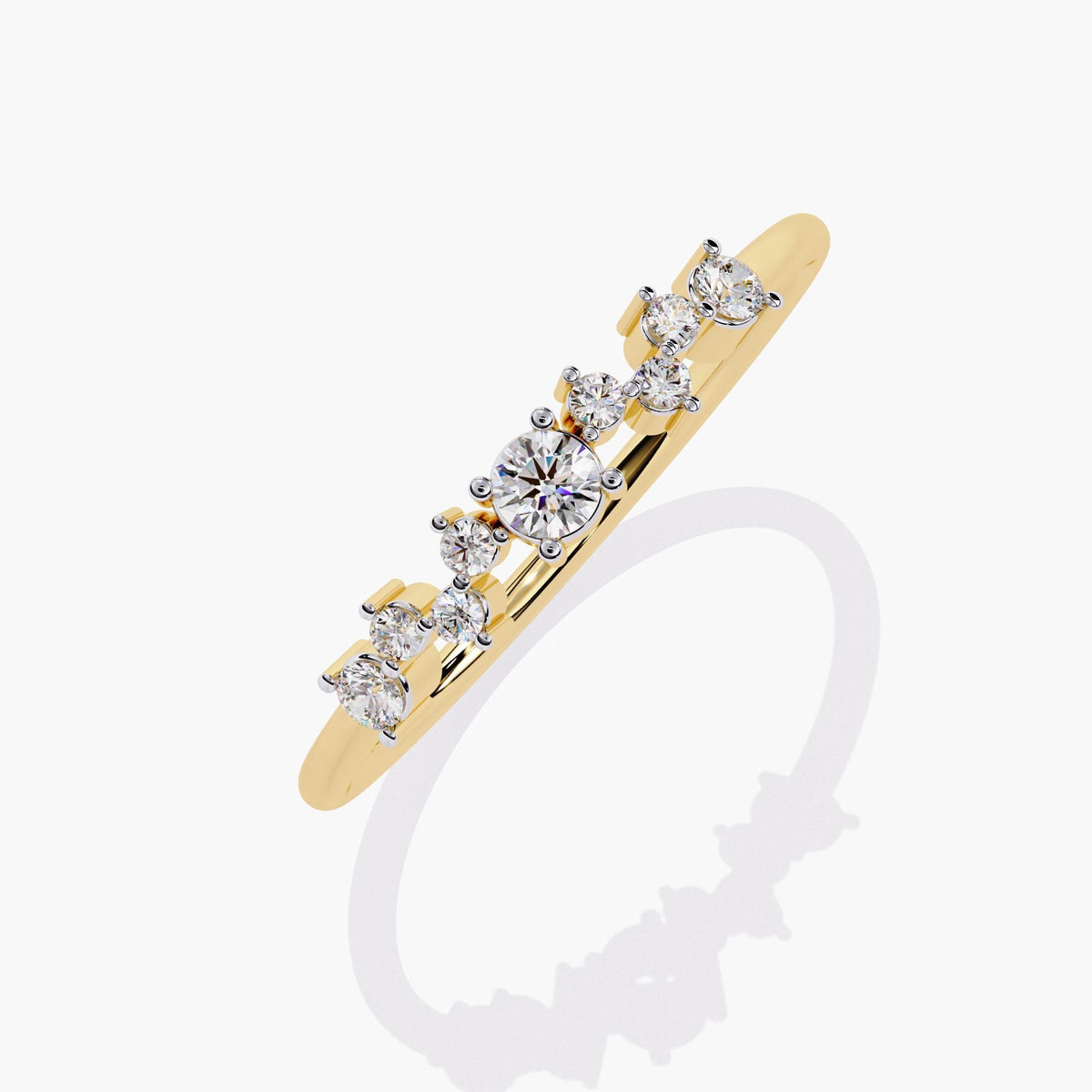 A yellow gold band ring with a cluster of small diamonds and a larger round diamond in the center.
