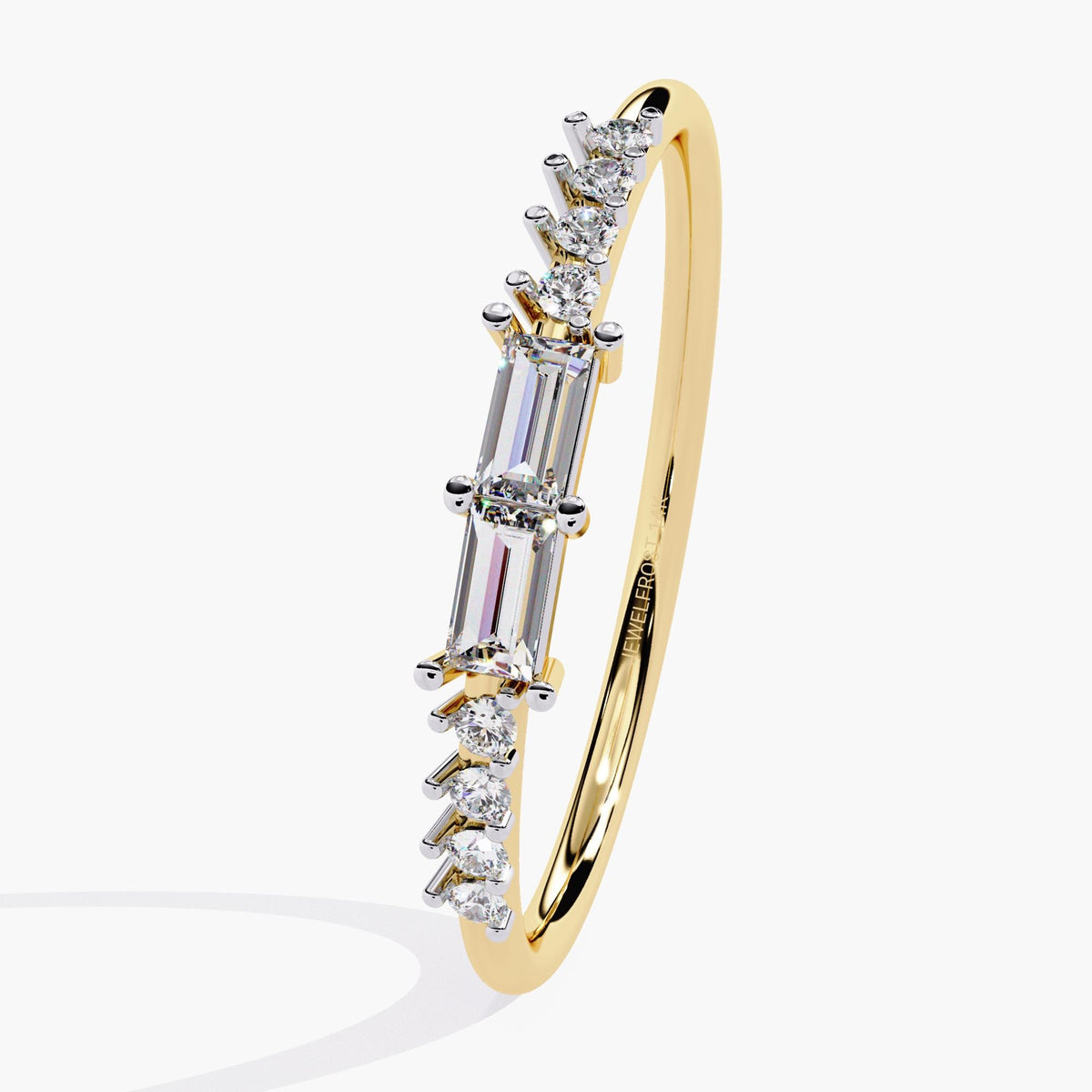 A yellow gold band ring with a baguette diamond and smaller round diamonds on the band.