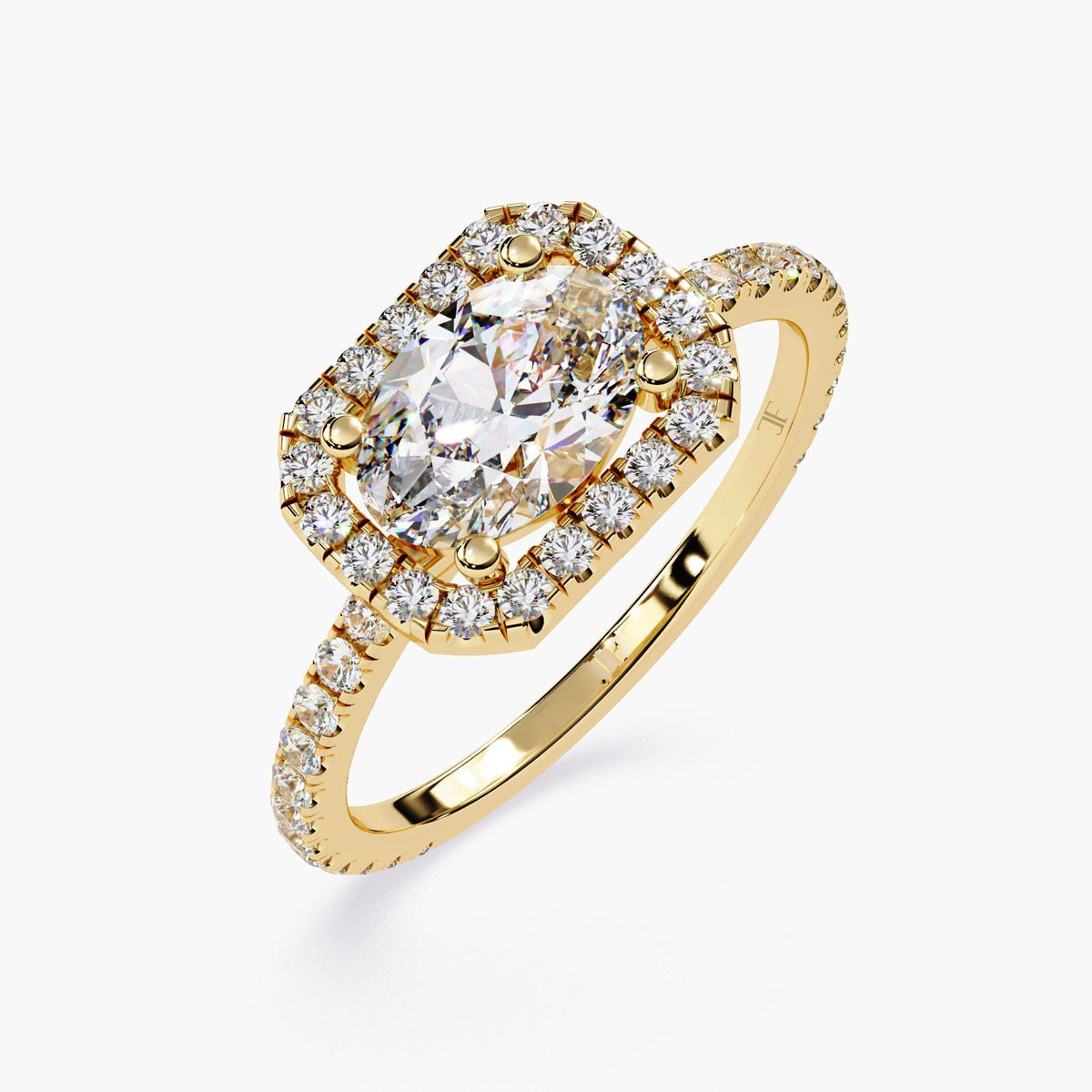 A gold ring with an oval cut diamond center stone surrounded by a halo of smaller diamonds.