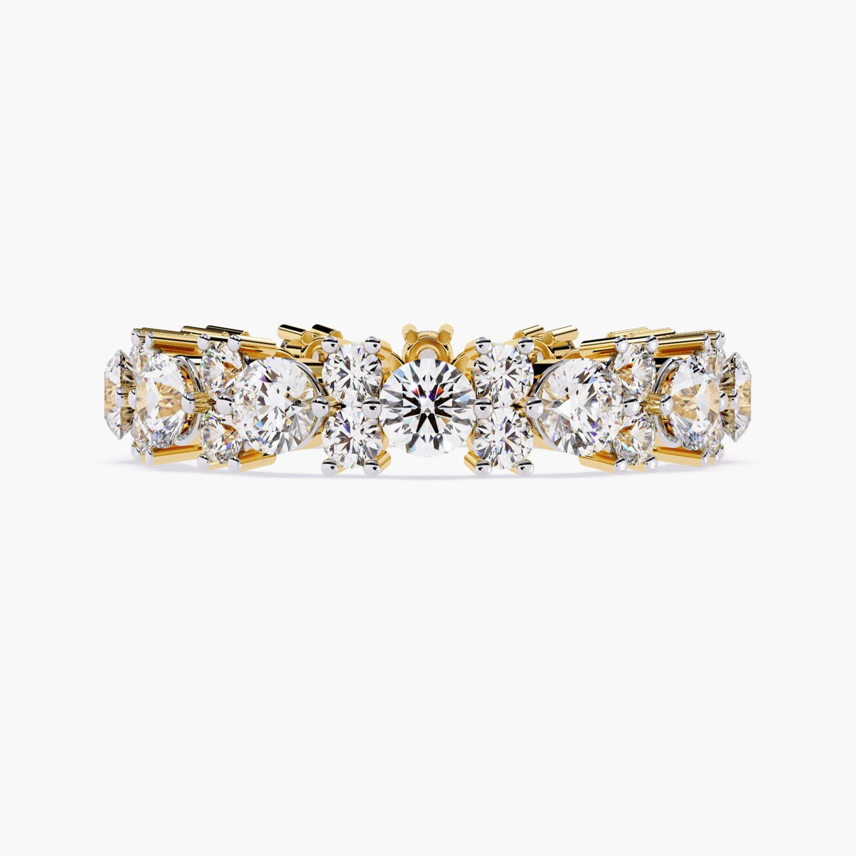 A gold full eternity ring with round cut diamonds in different sizes.