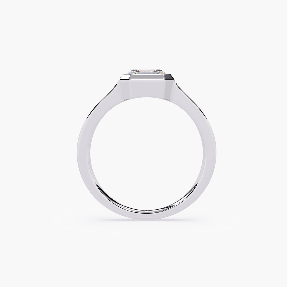 A white gold asscher signet ring.
