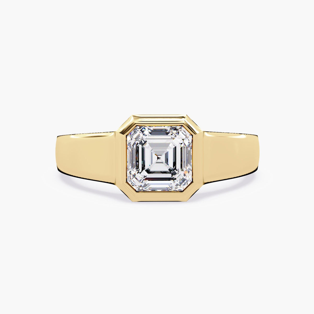 A gold asscher signet ring.
