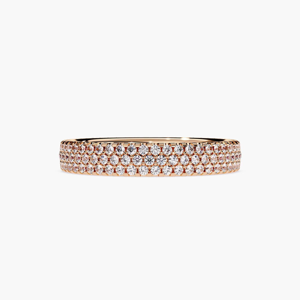 Rose gold eternity band with 3 rows of small diamonds around the band.