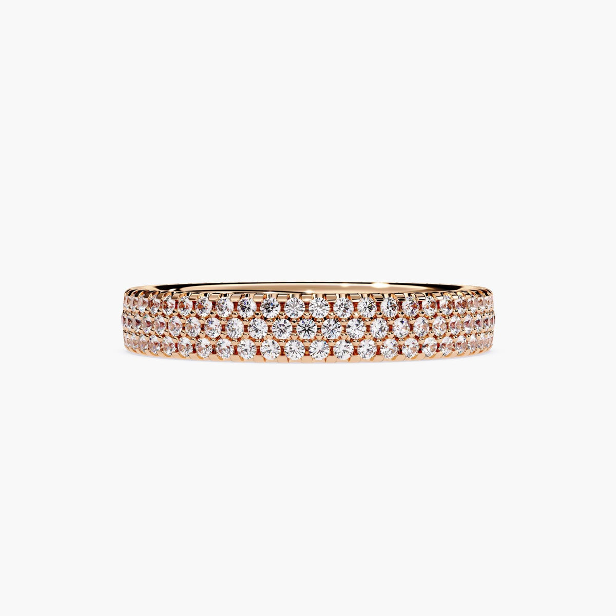 Rose gold eternity band with 3 rows of small diamonds around the band.