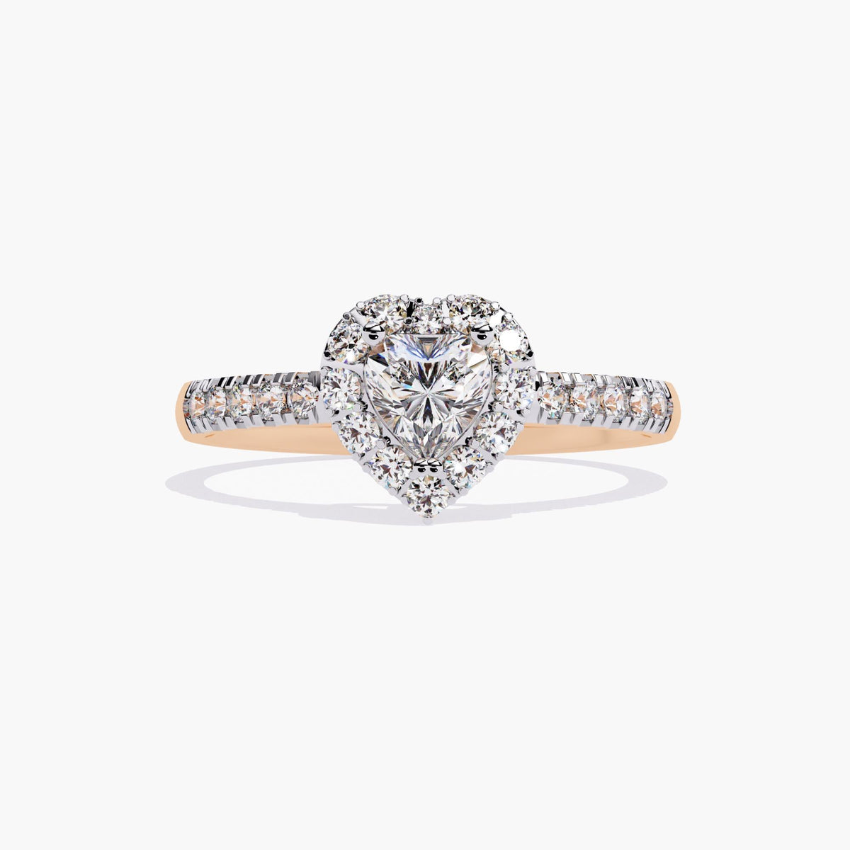 A heart-shaped diamond engagement ring with a halo setting and a rose gold band.