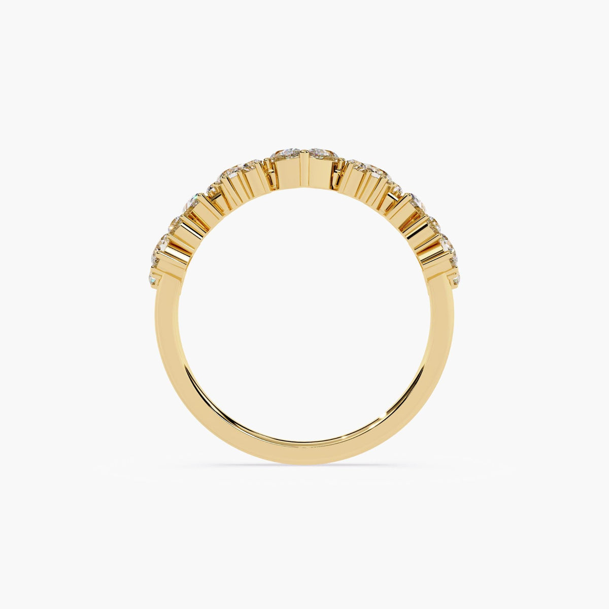 A curved gold half eternity ring with marquise and round shaped diamonds.