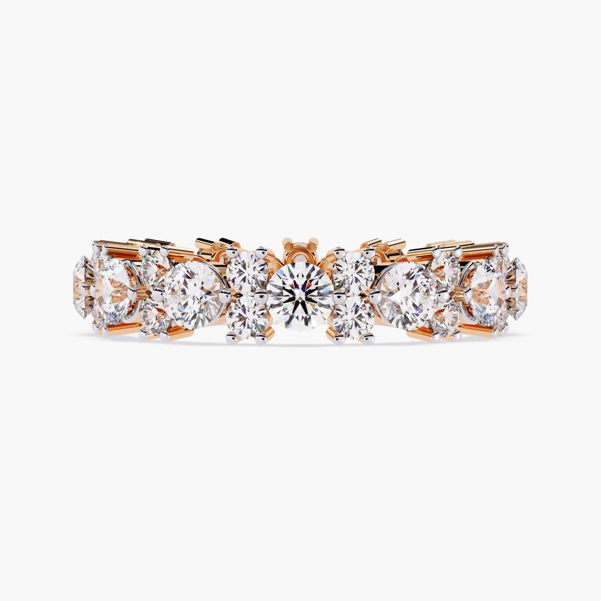 A rose gold full eternity ring with round cut diamonds in different sizes.
