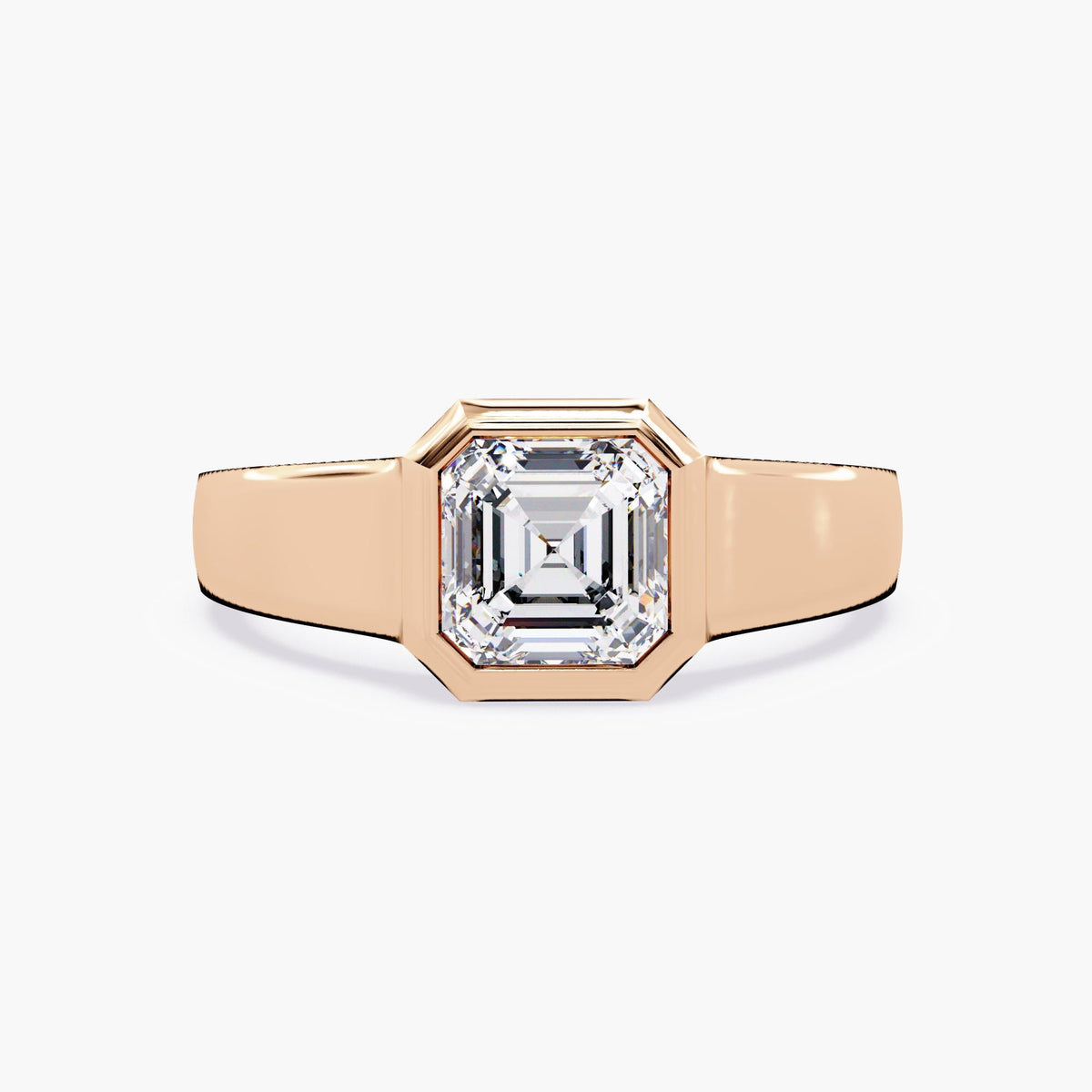 A rose gold asscher signet ring.