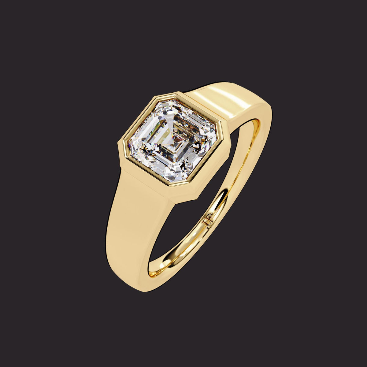 A gold asscher signet ring.