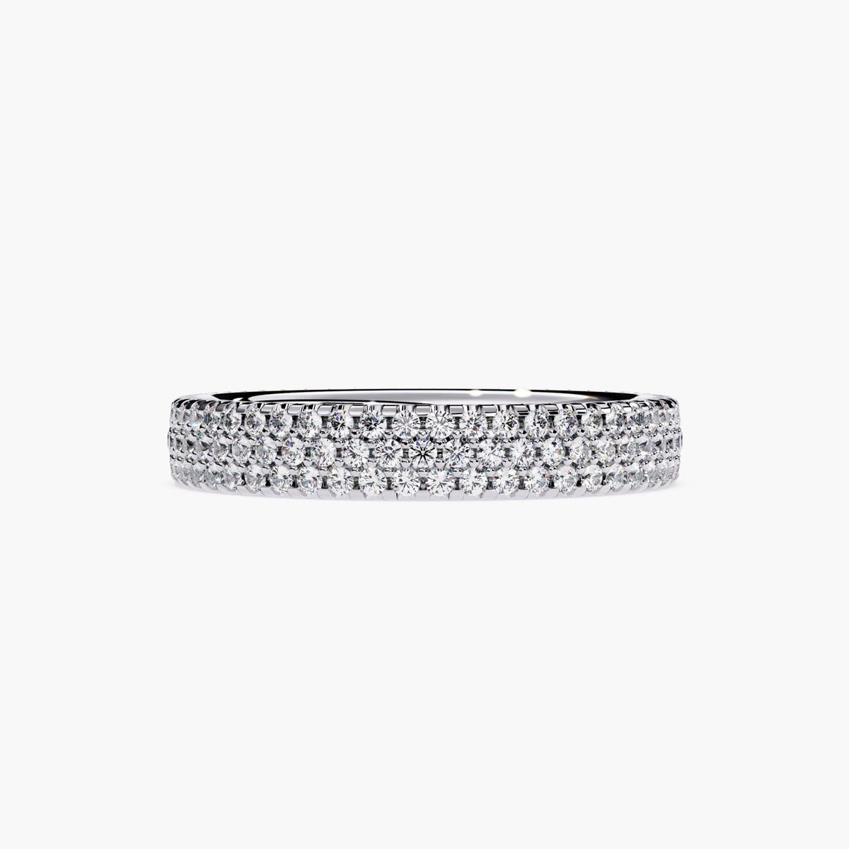 White gold eternity band with 3 rows of small diamonds around the band.
