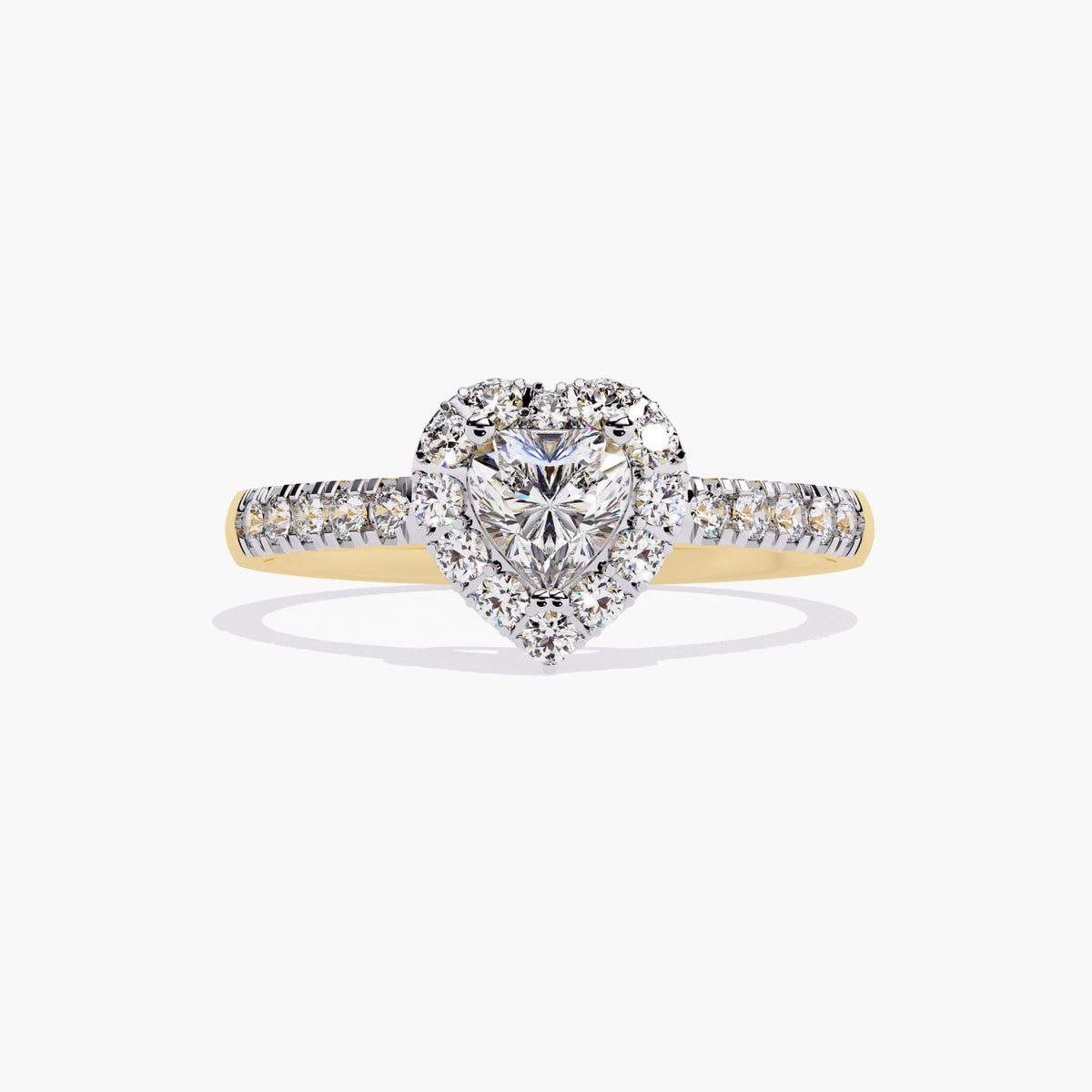 A heart-shaped diamond engagement ring with a halo setting and a gold band.