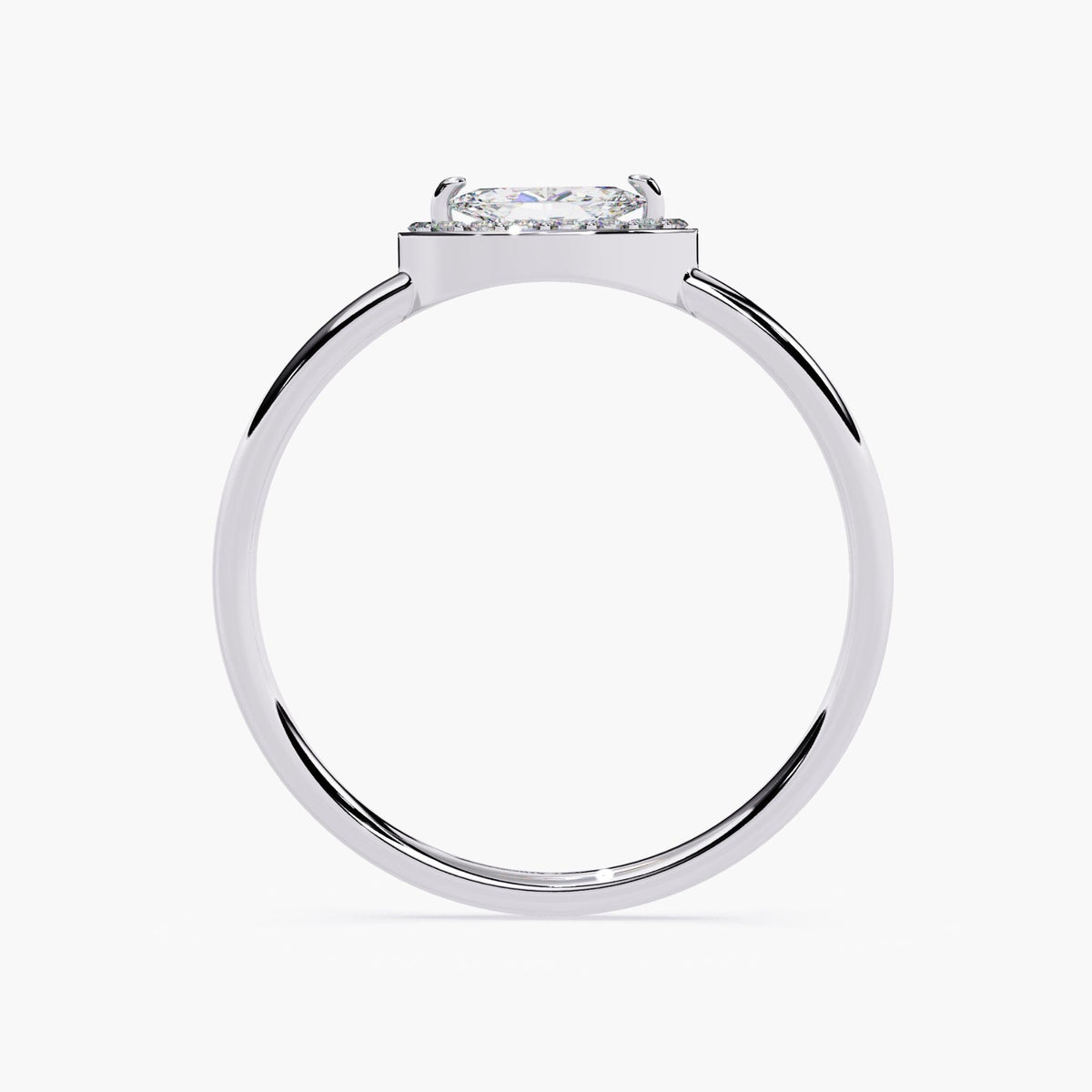14K white gold marquise halo ring, highlighting the low-profile setting of the east-west marquise diamond. The slim, polished band emphasizes its lightweight and wearable design, suitable for stacking or everyday use.