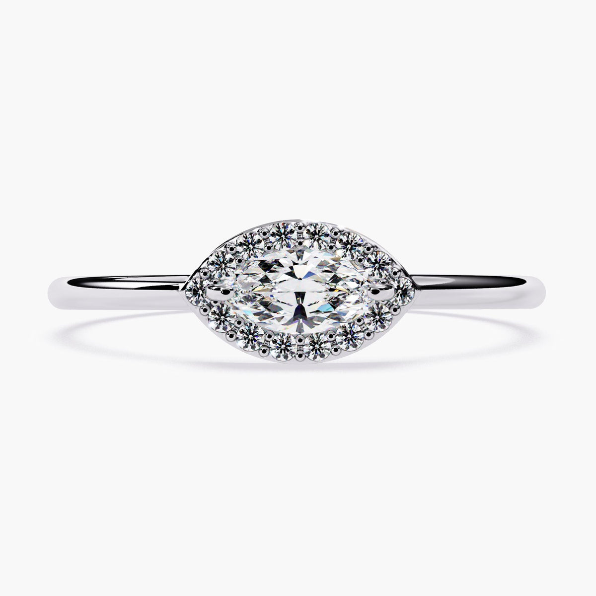 14K white gold marquise halo engagement ring with a horizontal 6x3mm marquise-cut center diamond surrounded by a scalloped halo of 1mm round diamonds. The slim, polished band gives it a dainty and modern silhouette, ideal for everyday wear or minimalist bridal style.