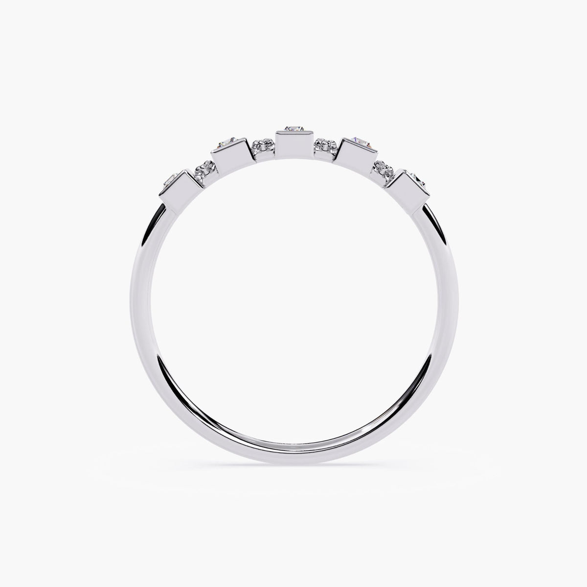 14k white gold five-stone baguette diamond ring, showing the low-profile bezel settings and geometric vertical arrangement of each diamond across a slim 1.3mm band.