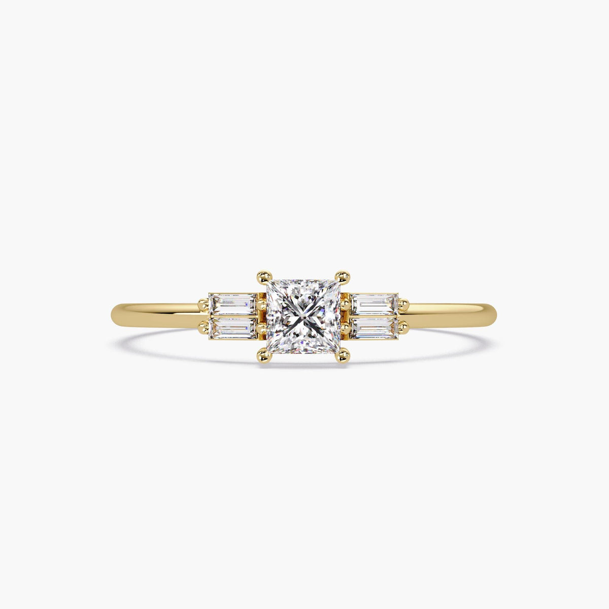 14K yellow gold ring with a princess cut center diamond and baguette side diamond accent, shown on a white background.