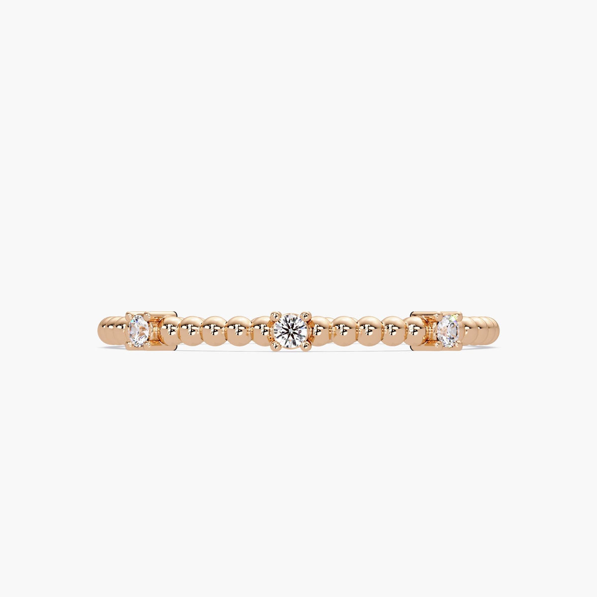 14K rose gold diamond ring with a minimalist design, featuring round diamonds set in a delicate chain band.