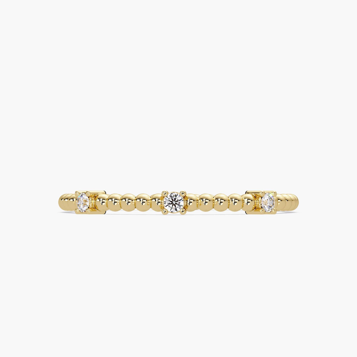 14K yellow gold beaded band with three diamonds: one 2mm round diamond in the center and two smaller diamonds on each side, set in four-prong settings