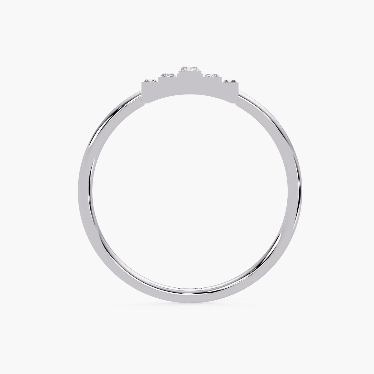 Side profile of a 14k white gold baguette diamond ring showing the low-set stepped half bezel design and slim, polished band.