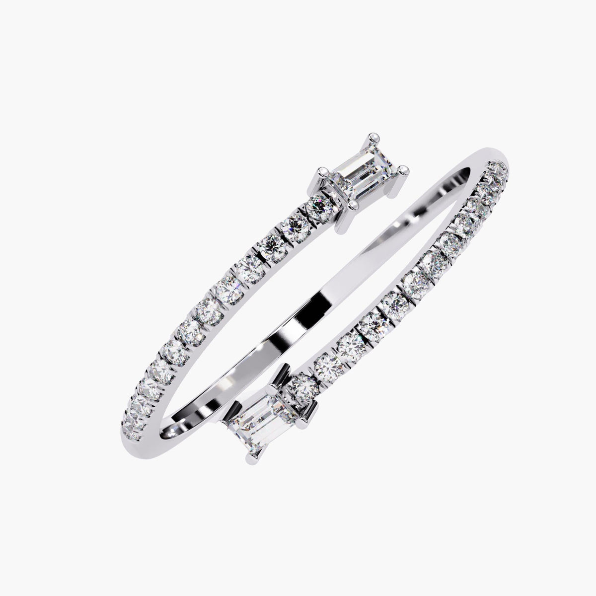 Angled view of a 14k white gold open diamond ring featuring a bypass design with pavé-set round diamonds and horizontally set baguette diamonds on each tip.
Can be worn solo for a minimal look or paired with slim bands.
Intended for stacking, gifting, or daily use.
Design inspiration combines geometric precision with asymmetrical movement.