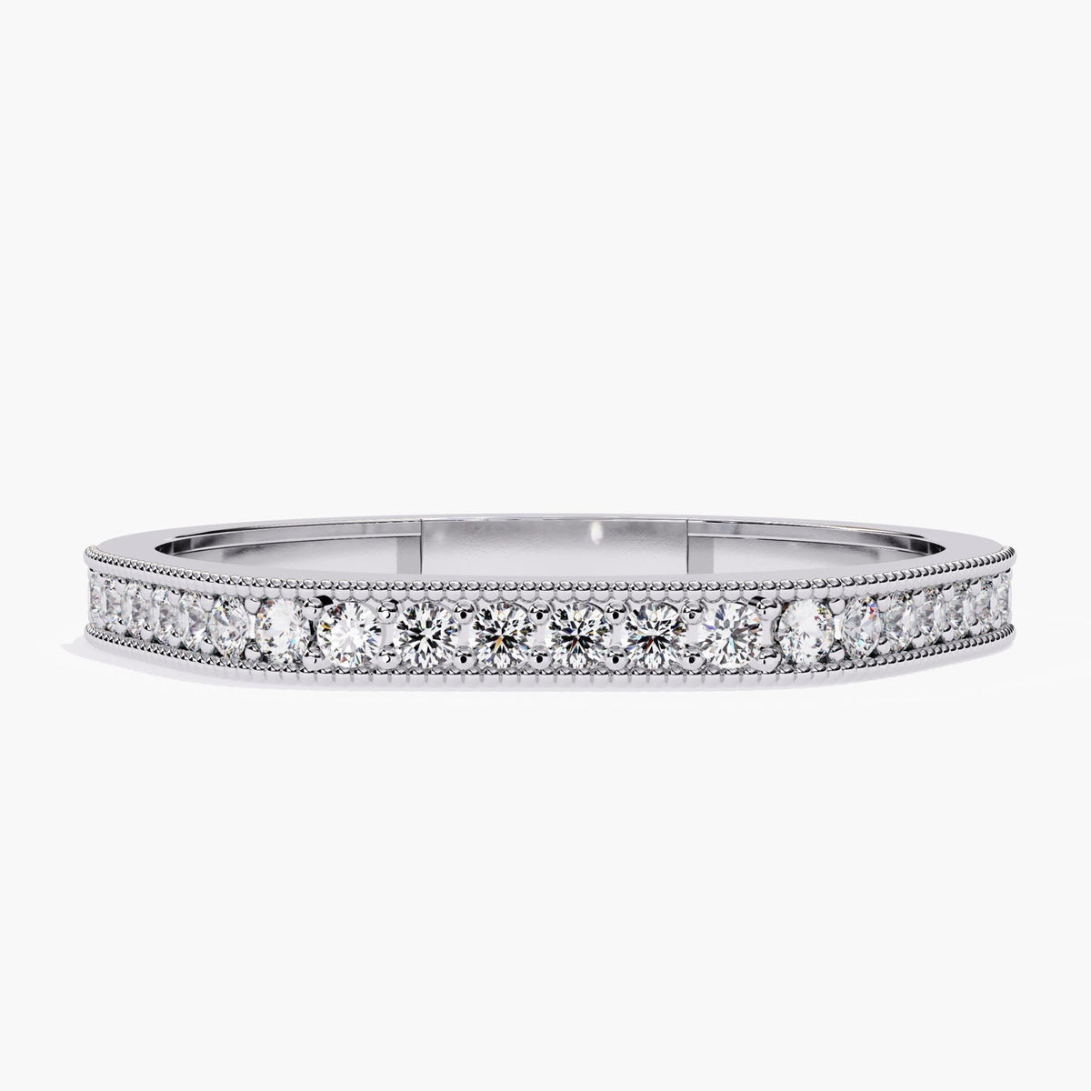 Front view of a 14k white gold flat-top ring featuring a row of round lab-grown diamonds and delicate milgrain detailing along the edges. Can be styled alone or stacked with other minimal bands for a layered look. The structured band and clean lines give it a geometric, modern-classic appeal.