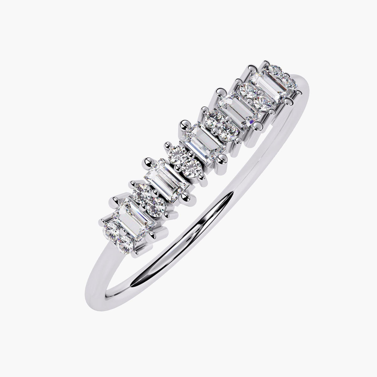 Angled view of a white gold ring showcasing vertically set baguette diamonds alternating with round diamonds across the top. The slim band and prong settings give the ring a clean, structured look with a touch of sparkle.