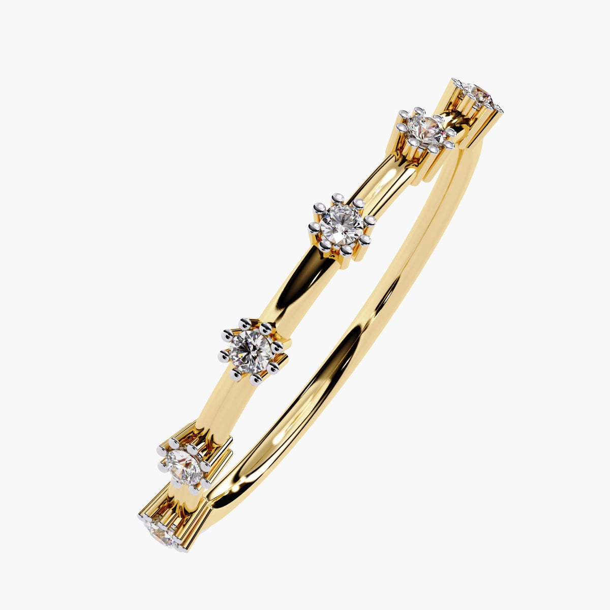 Angled top view of a 14k yellow gold floating diamond ring with six round natural diamonds in evenly spaced claw prong settings. The slim gold band curves delicately, emphasizing the airy negative space between each 1.5mm diamond.