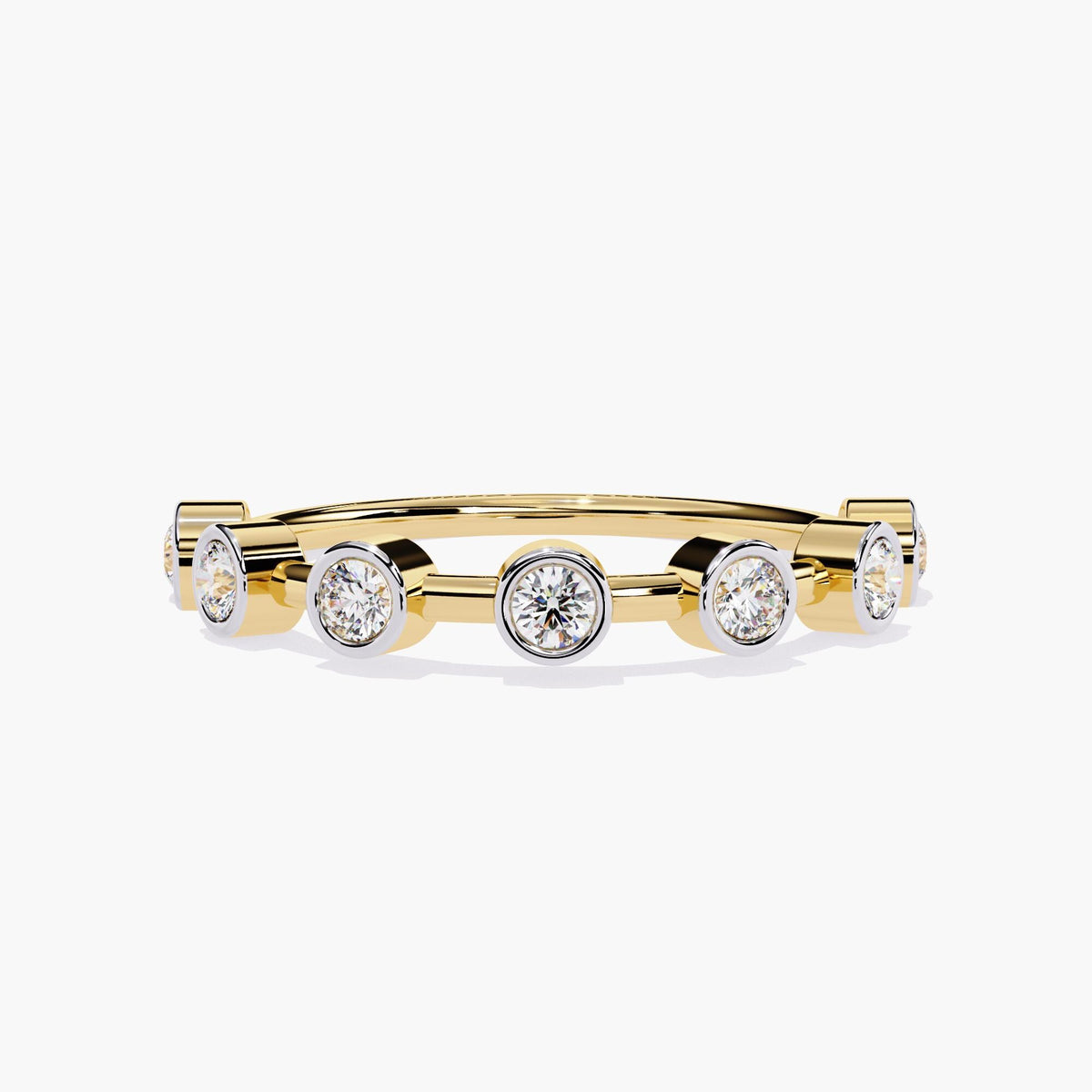 A yellow gold bezel-set wedding band featuring round diamonds evenly spaced around the band. Each diamond is securely held in a polished bezel setting, offering a clean and modern design. This elegant halfway eternity engagement ring is perfect for stacking or wearing alone, providing a timeless and sophisticated look with its simple, minimalist style.