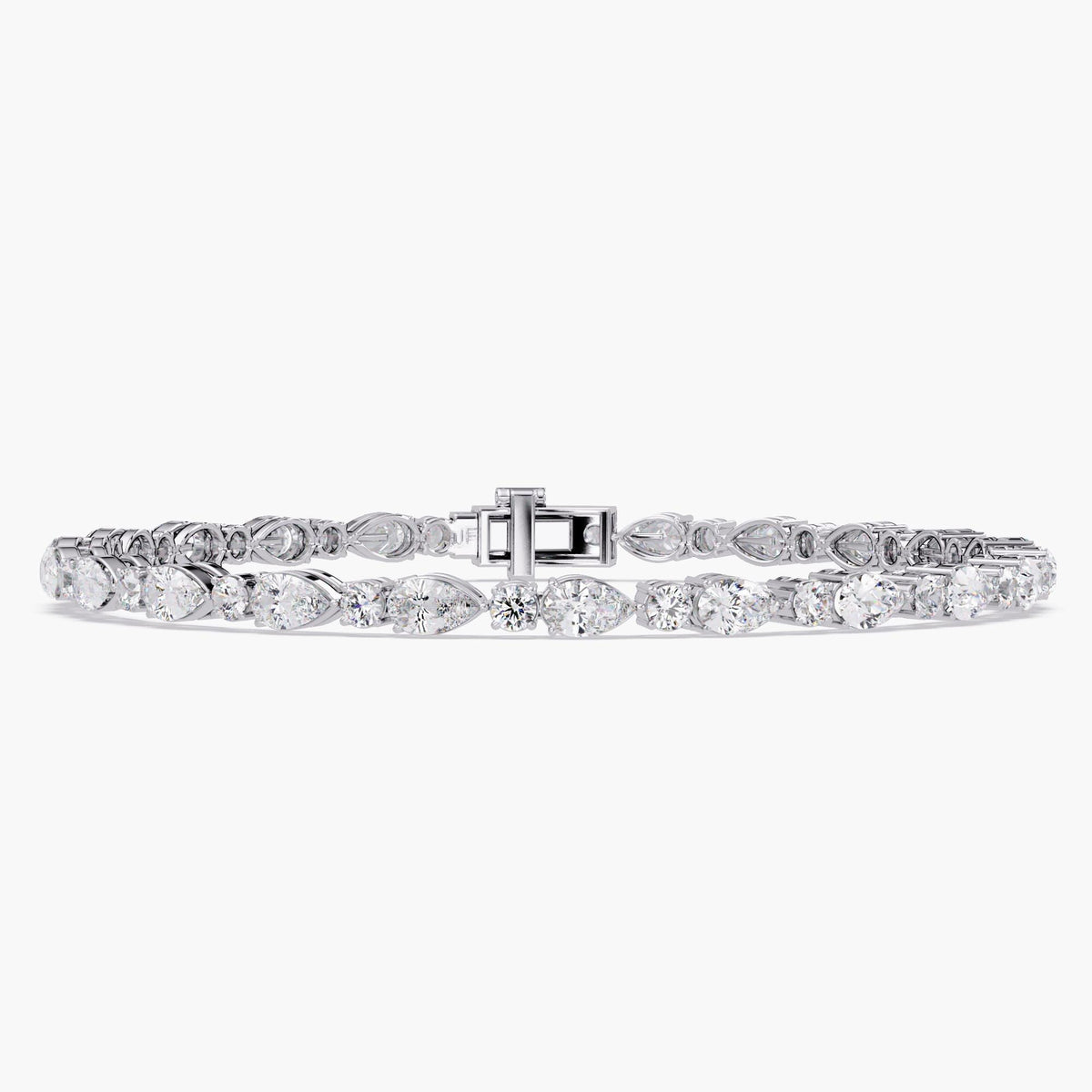 14k white gold lab-grown diamond tennis bracelet featuring alternating pear and round diamonds in prong settings, shown flat with clasp for full front view.