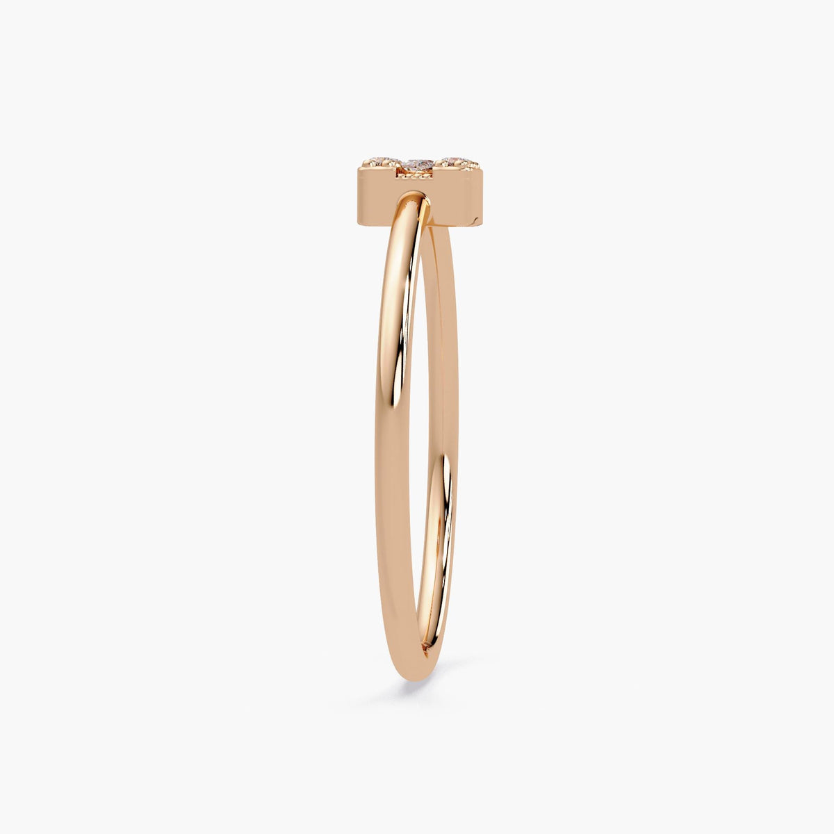 Side view of the rose gold ring showing the profile and height.