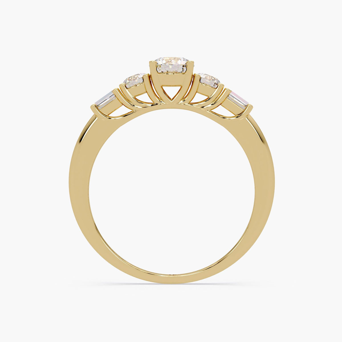 14k yellow gold five-stone ring with a trellis prong setting. The setting arches upward to lift each diamond, including the tapered baguette accents, creating an open, airy view of the stones from beneath.