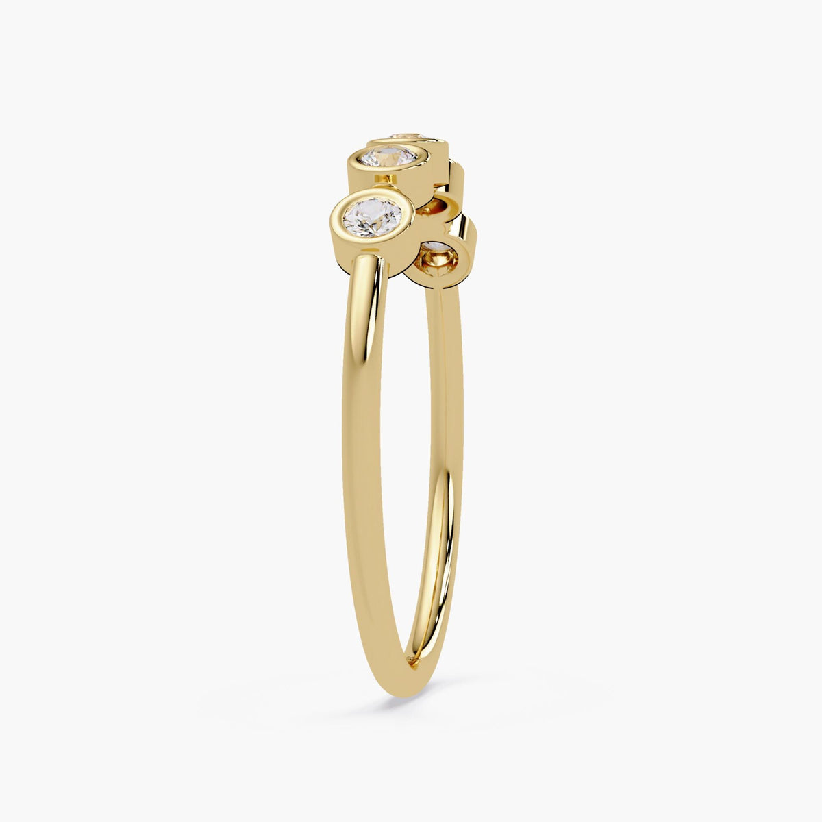 A 14K yellow gold band featuring five bezel-set round diamonds. The diamonds are set evenly along the band.