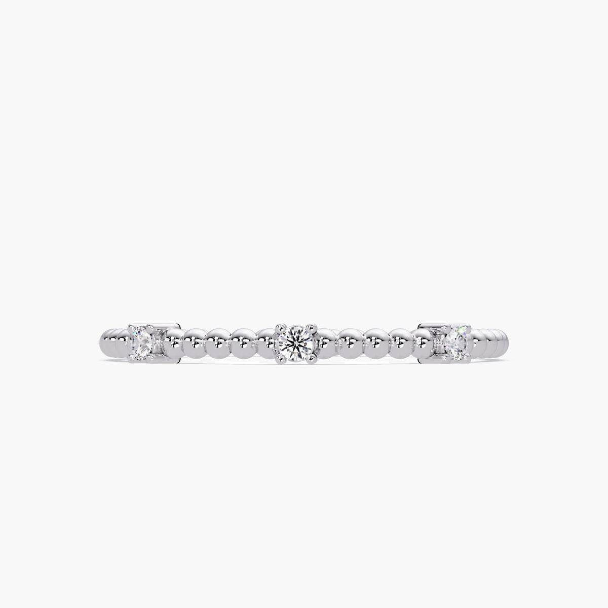 14K yellow white beaded ring with three 1.5mm round diamonds, set in four-prong settings, featuring a 1.3mm band.
