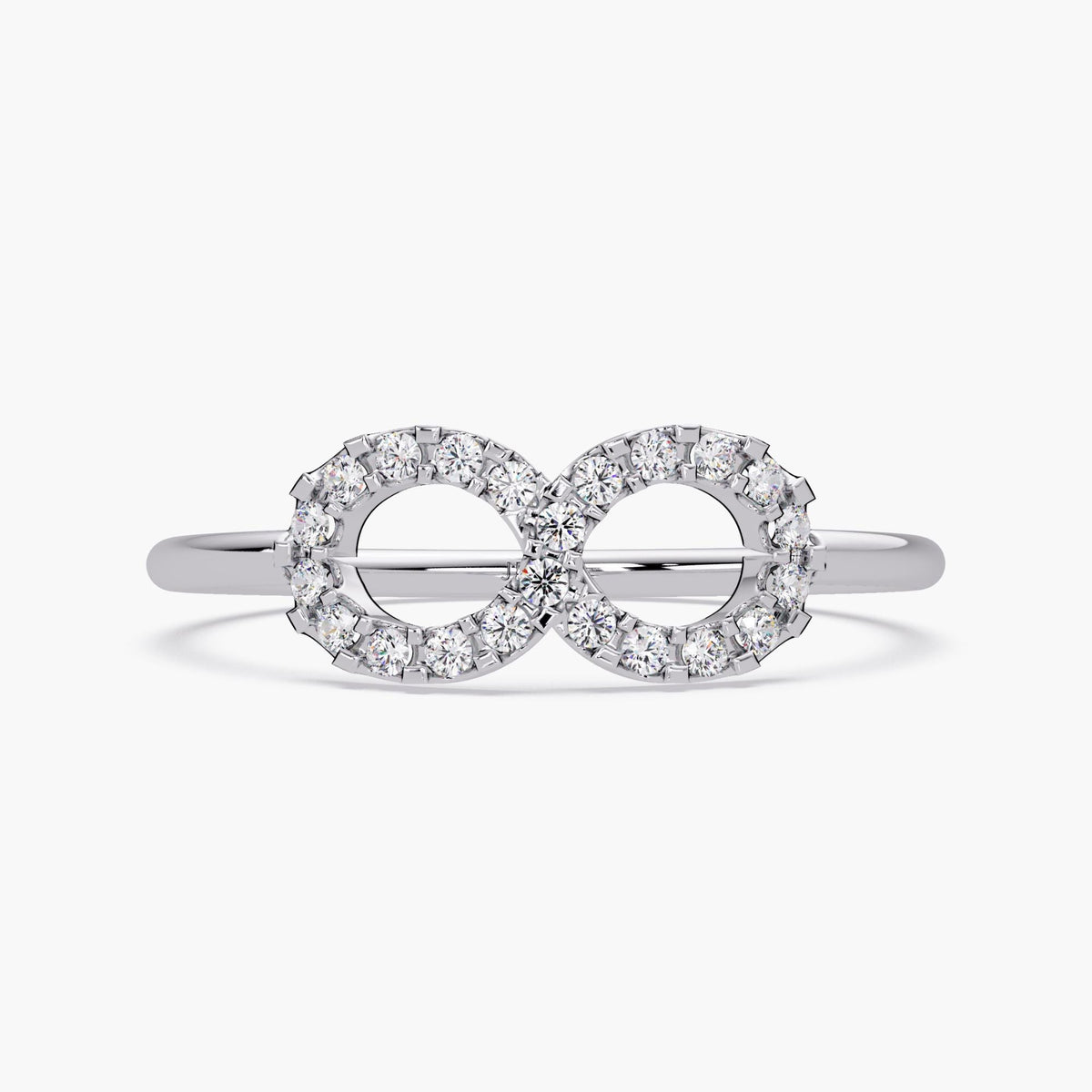 Front view of a 14k white gold infinity ring with 22 round lab grown diamonds in a pavé setting, forming a double-circle infinity symbol on a slim polished band.